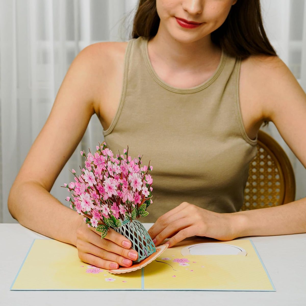 Open pop-up card with detachable cherry blossom bouquet