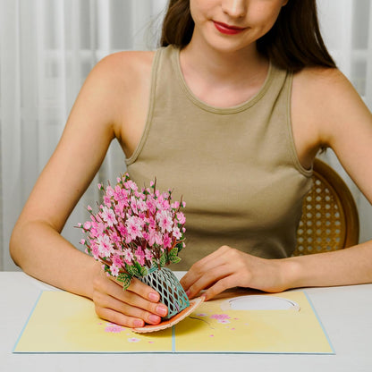 Open pop-up card with detachable cherry blossom bouquet
