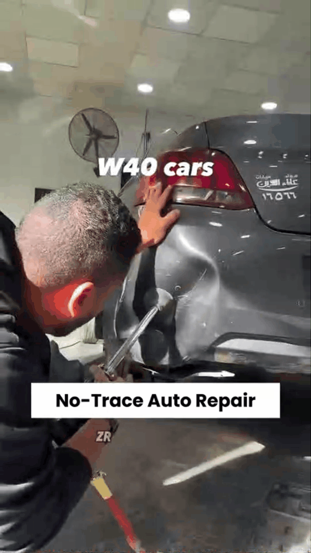 Demonstration of a pneumatic dent puller on a car body