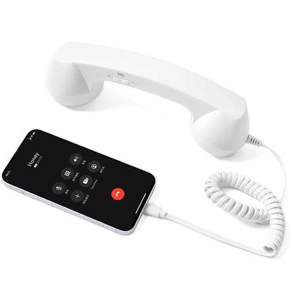 White retro handset with coiled cord and smartphone