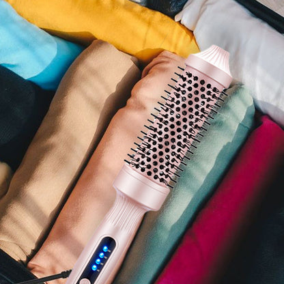 Compact brush with light-up heat controls