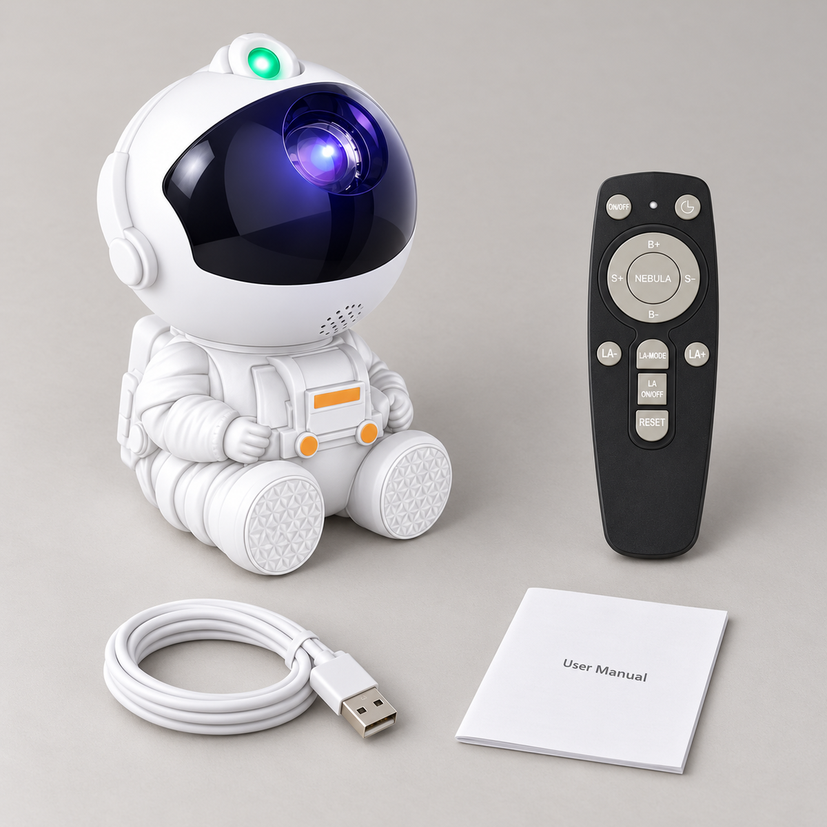 Box contents: one astronaut projector, remote, USB cable and manual